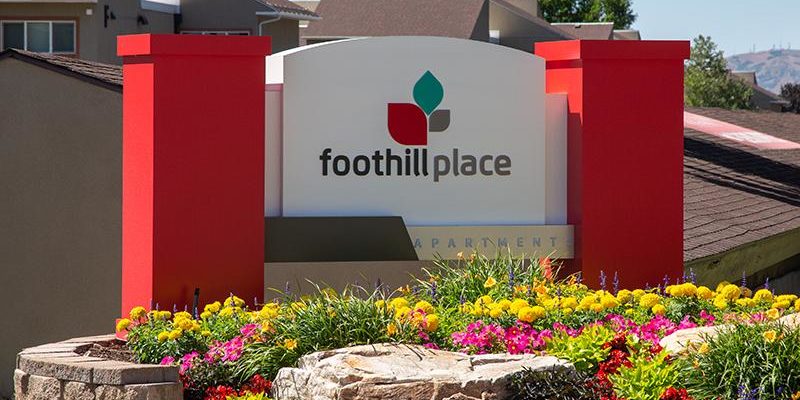 Signage that says Foothill Place Apartments