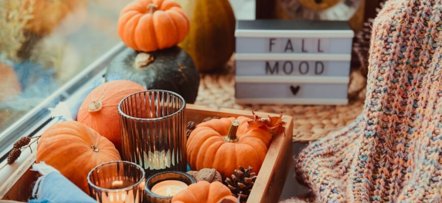 Autumn,Cozy,Mood,Composition,On,The,Windowsill.,Pumpkins,,Cones,,Candles
