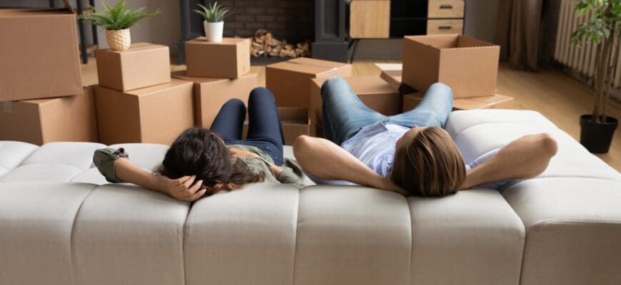 Back,Rear,View,Tired,Young,Family,Couple,Lying,On,Comfortable